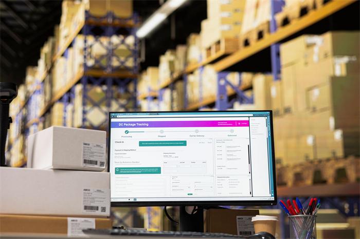 Warehouse staff scanning China parcel before international shipping