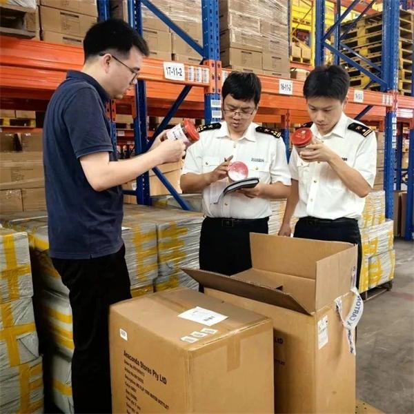 Export goods being inspected at a China warehouse before international shipment