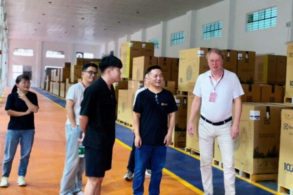 Warehouse inspection of packaged air conditioning equipment before shipment from China